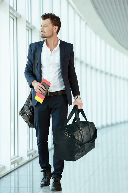 K0024AB | Canvas/Vera Leather Travel Duffle Bag, full-grain, ruffled - Black Color. Nickel Antique Accessories, Zipper Closure. Dimensions: 48 x 31 x 22 cm - Packaging: Tnt bag-1